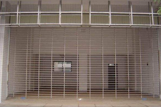 China Puertas de persianas de seguridad para lugares públicos / casas, persiana de rodillo de metal resistente y duradero proveedor